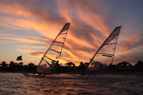 Windsurfing at evening and dusk